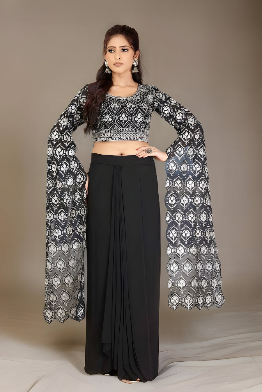 Black georgette crop top and skirt lehenga featuring a designer floral print, perfect for stylish occasions.