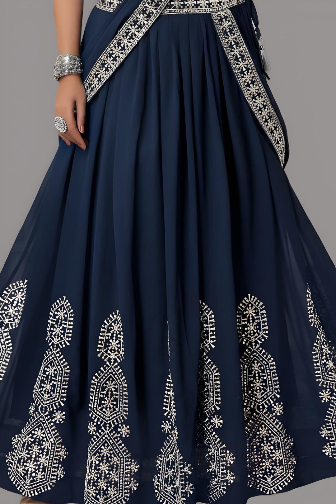 Elegant blue crop top and skirt combination for weddings and parties.