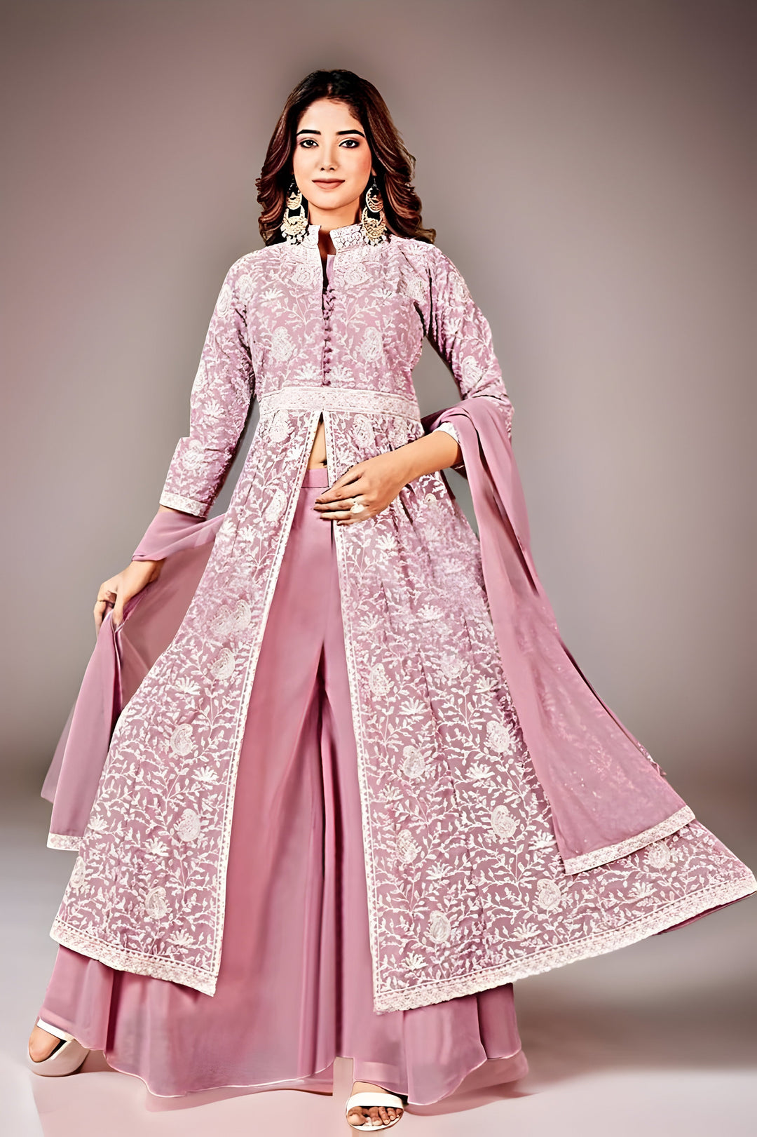 Vibrant pink peplum lehenga set, a chic outfit perfect for festive occasions.