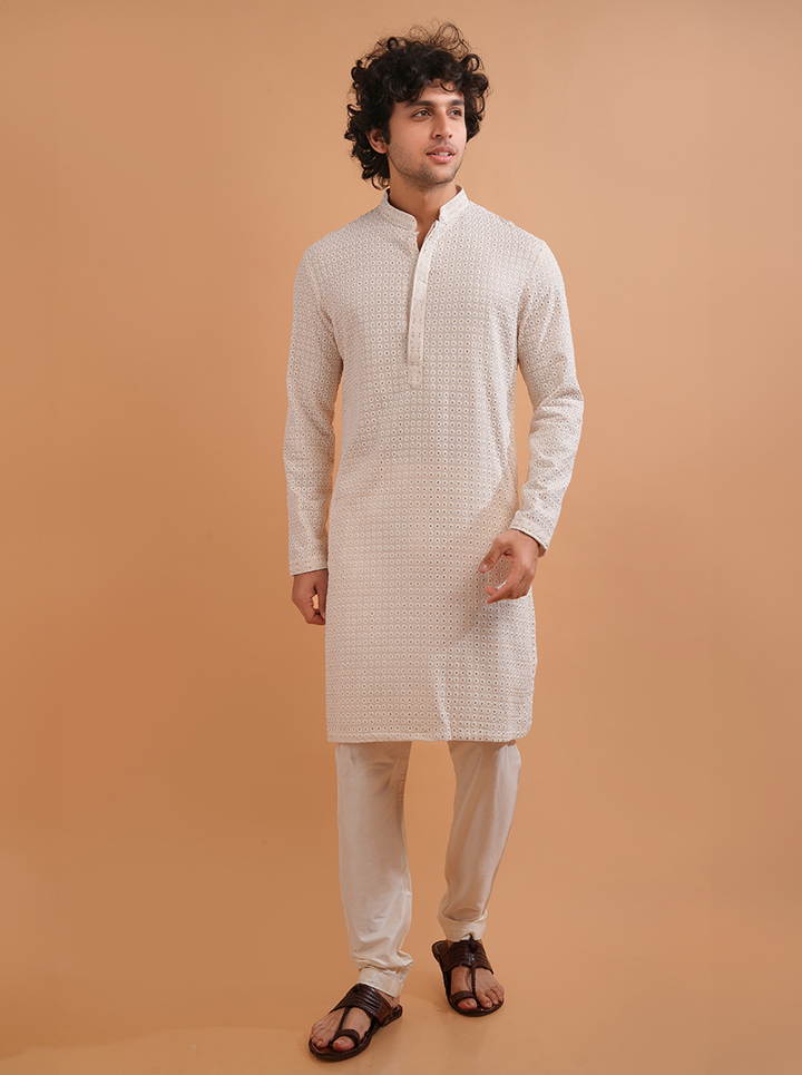 Elegant embroidered cream kurta pajama for men, ideal for USA poojas and gatherings.