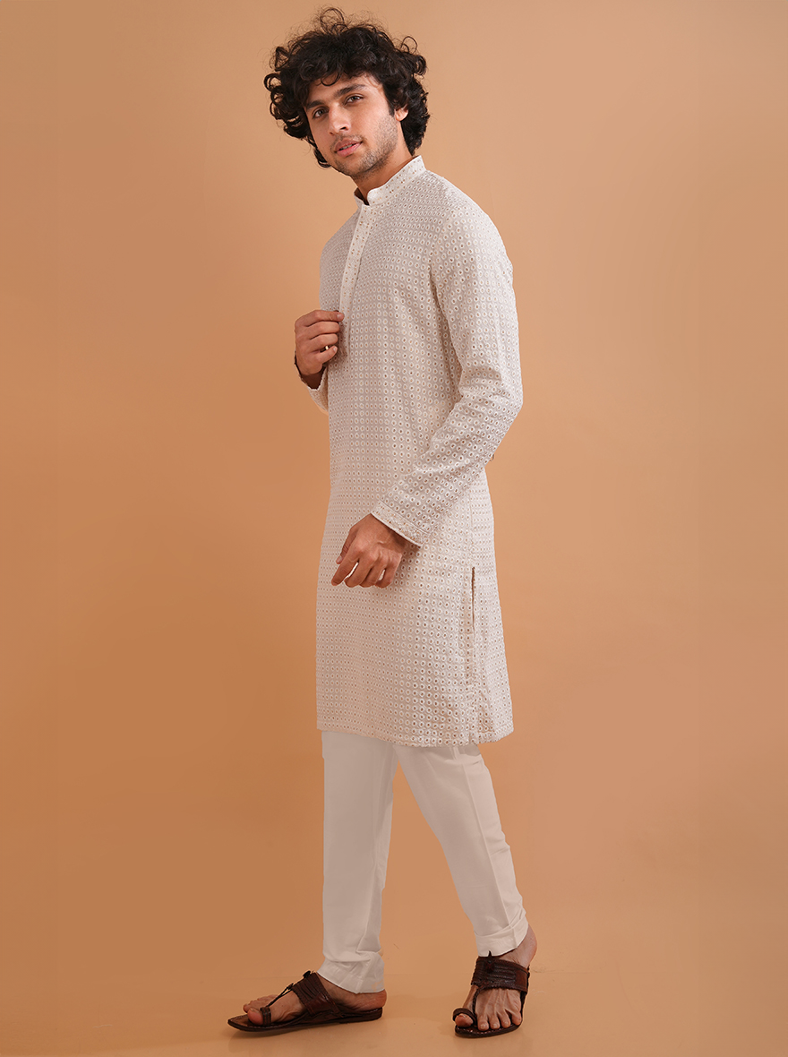 Sophisticated cream kurta pajama with detailed embroidery, perfect for USA traditions.