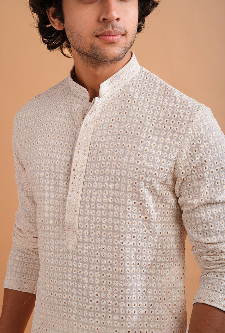 Cream silk blend kurta pajama set for men, designed for elegance and traditional wear.