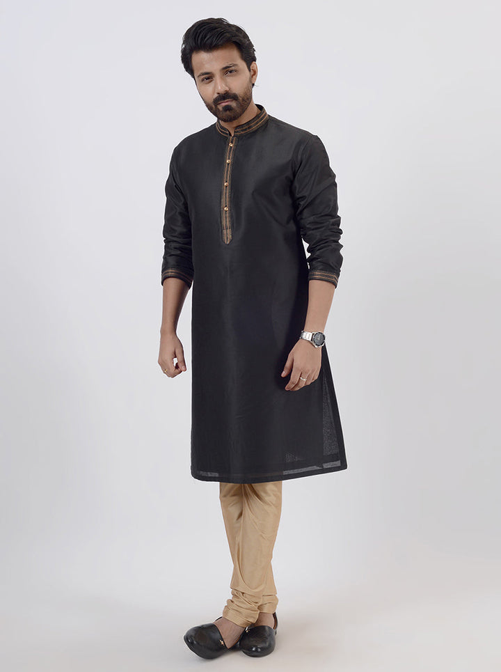 Comfortable and luxurious black kurta pajama for men, made from silk blend for ultimate elegance.