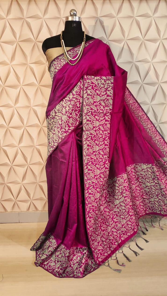 Traditional bright pink raw silk saree with a rich pallu, perfect for Indian festivals and ceremonies.