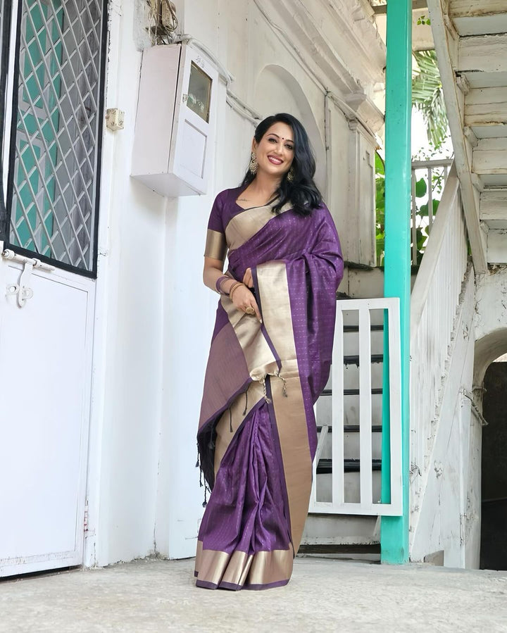 Elegant lavender Banarasi raw silk saree with intricate zari border and pallu, designed for festive wear.