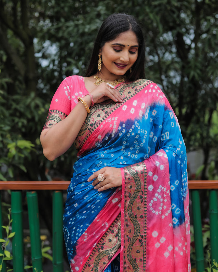 Beautiful blue Bandhej Tapeta silk saree with rich dual-tone effect, perfect for festive events.