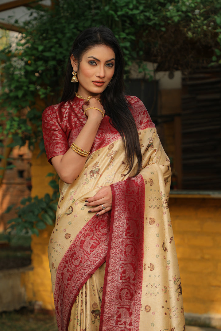 Elegant cream Kanjivaram soft silk saree with intricate weaving and traditional borders, perfect for special occasions.