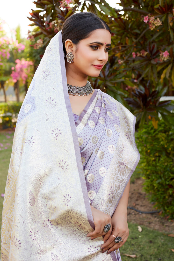 Purple Kanjivaram saree with shimmering satin finish, featuring exquisite weaving butta work and a rich woven pallu.