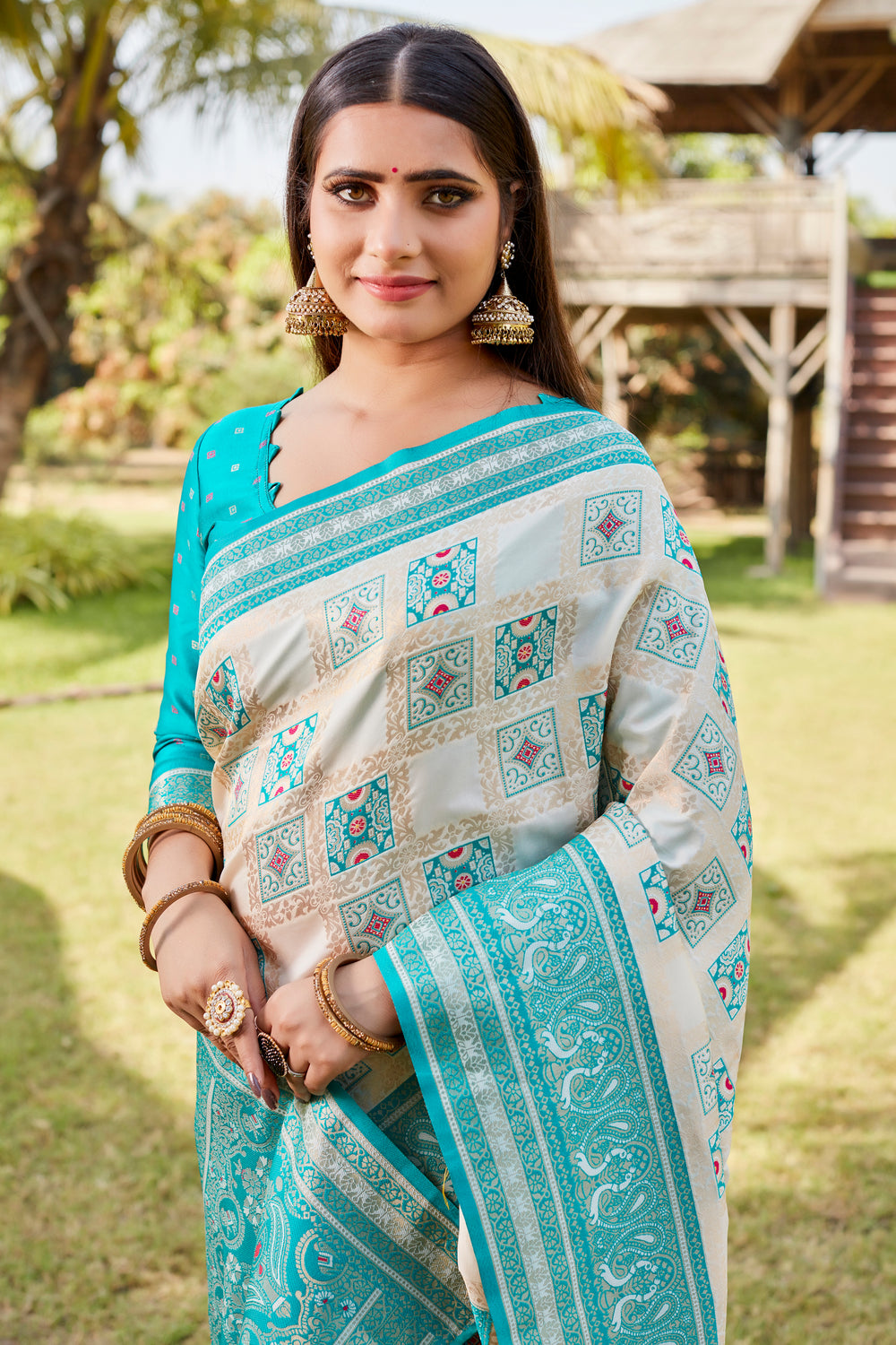 Elegant sky-blue Kanjivaram soft silk saree with fancy borders and traditional patterns.