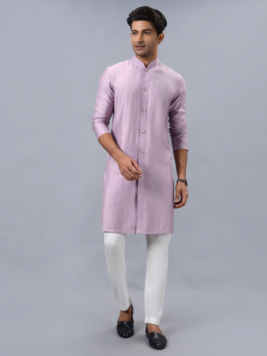 Stylish pink kurta pajama set for men, designed for festive and formal occasions.