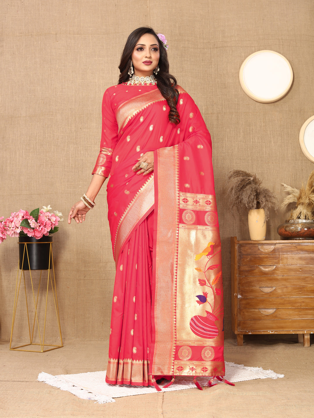 Elegant orange Paithani silk saree with luxurious zari and meenakari work for special occasions.