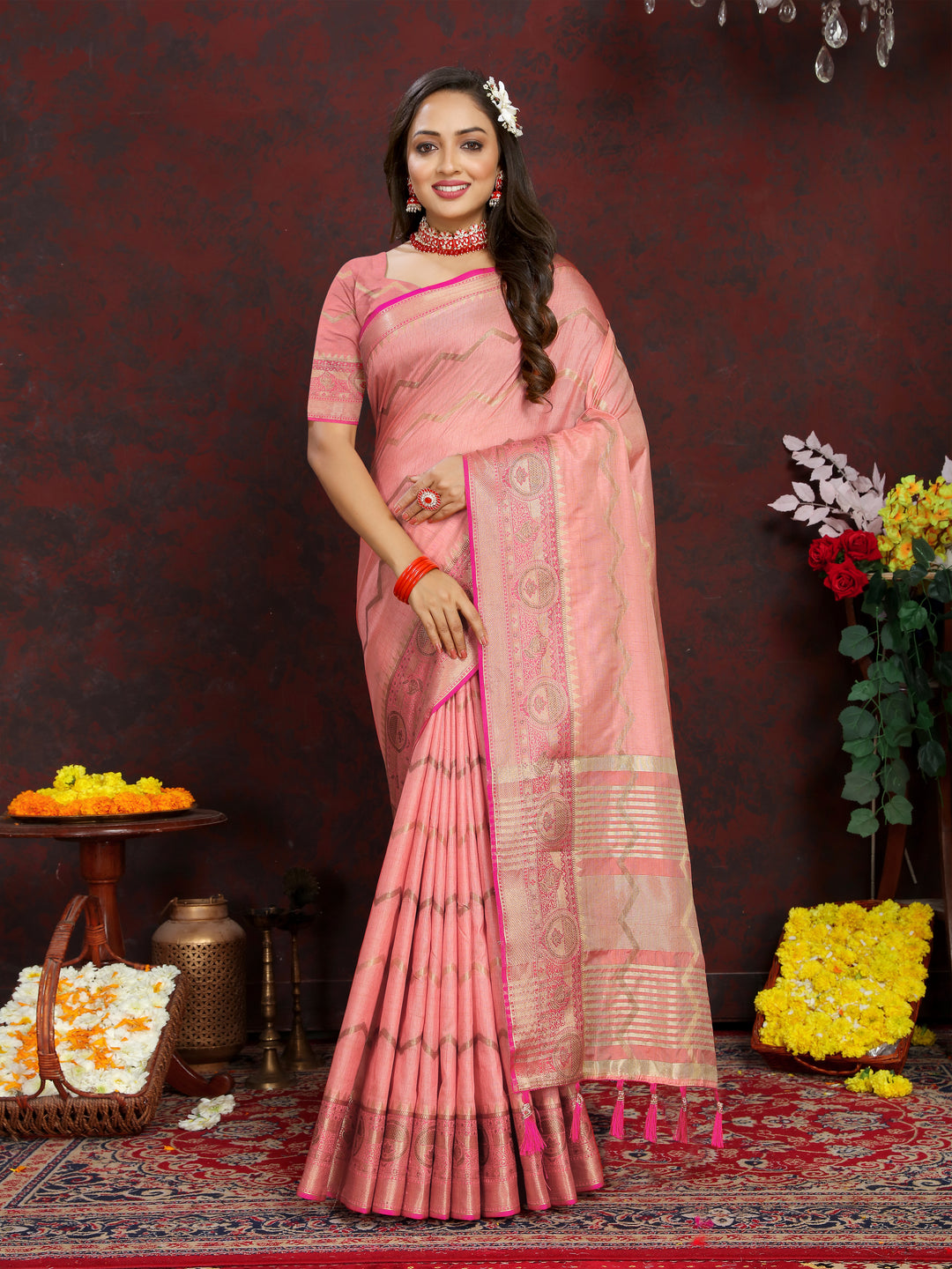 Peach Katan silk saree with intricate zari weaving, perfect for weddings and traditional events.