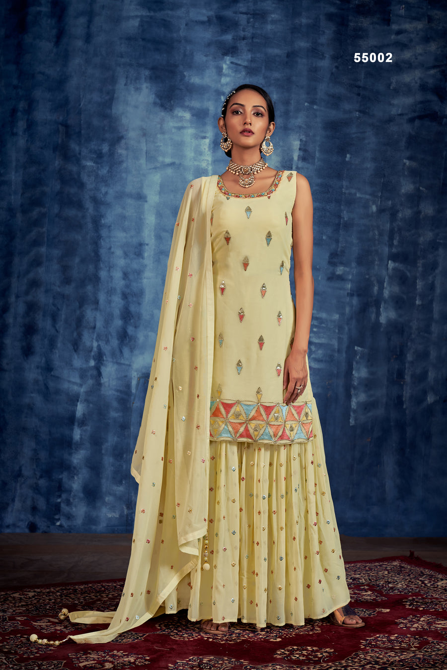 Yellow Multi Embroidery Sharara Style Suit with Golden Zari, Stones & Beads for Weddings and Festive Occasions.