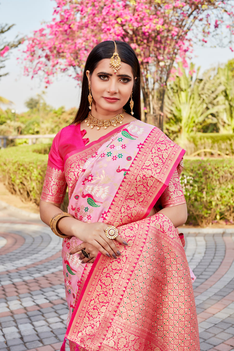 Baby Pink Radiant Kanjivaram Soft Silk Saree with exquisite traditional design for weddings.