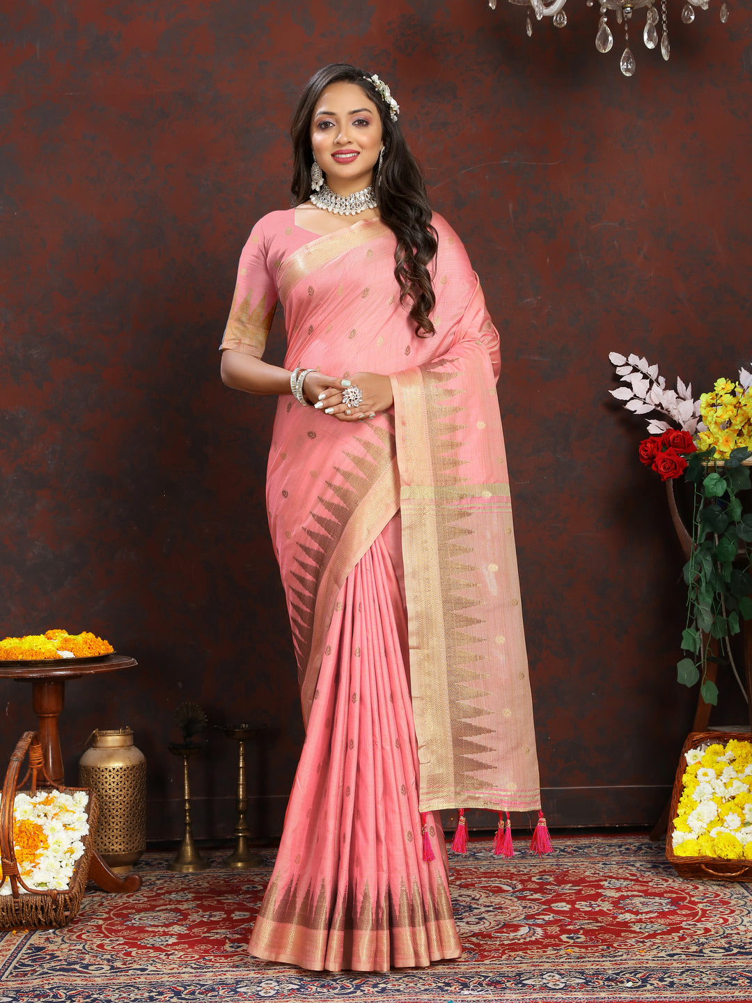 Elegant Peach Katan Silk Saree with intricate zari weaving and designer pallu tassels for weddings.