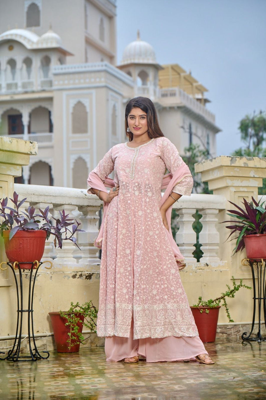 Peach bridal lehenga set featuring a stunning crop top and skirt, perfect for weddings.