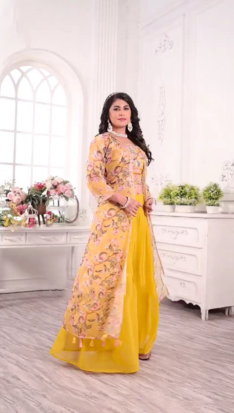 Vibrant yellow georgette palazzo set featuring a shimmery lurex bottom, perfect for stylish occasions.