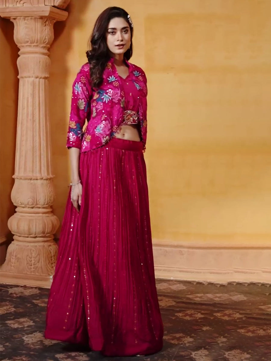 Chic bright pink floral crop top paired with a skirt lehenga set made from georgette fabric.