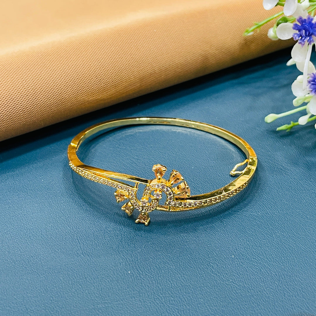 Stylish golden bracelet with a smooth finish, ideal for layering with other pieces.