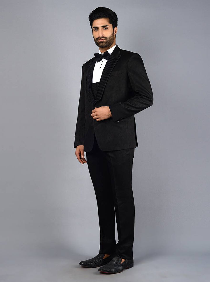 Elegant black jacquard suit with self-embroidery for men, tailored for formal wear and receptions.