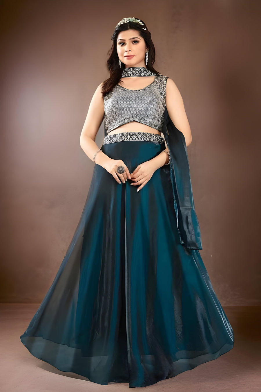 Deep sea blue floral crop top and skirt lehenga set made from jimmichu fabric, perfect for elegant occasions.