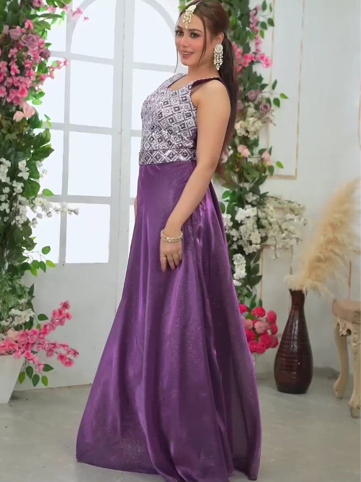 Chic purple ball gown dress with pleats and a slit, ideal for weddings and formal events.