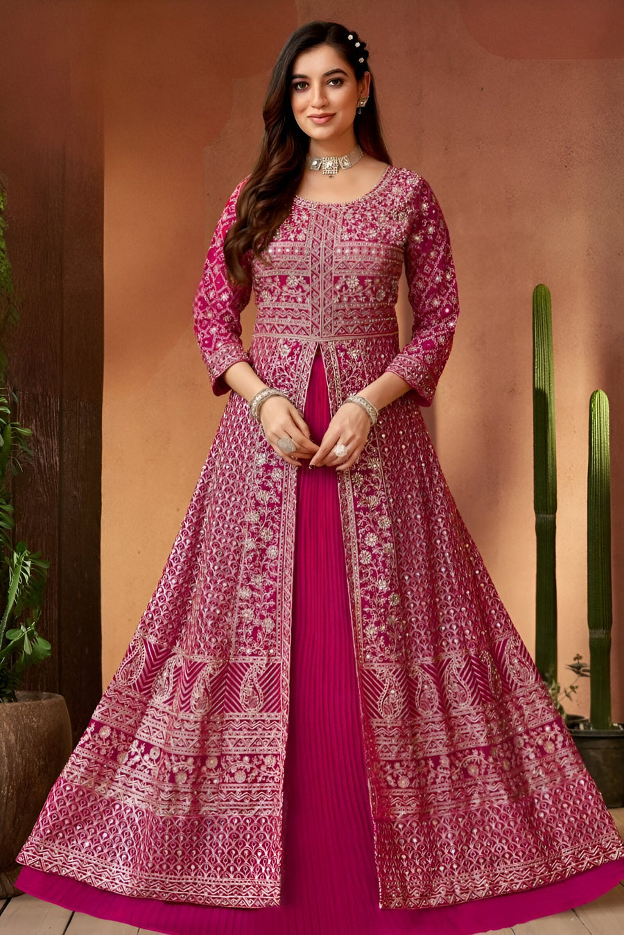 Bright pink peplum lehenga set made from georgette fabric, perfect for festive occasions.