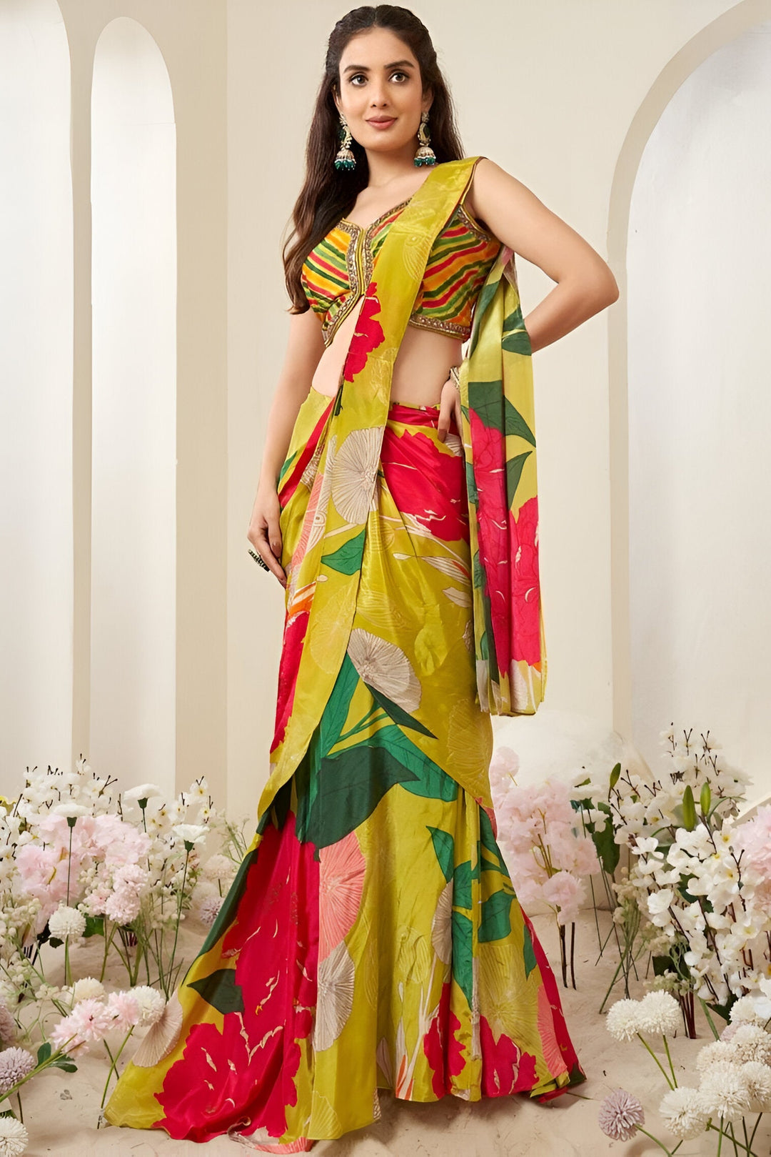 Stylish buttercup yellow draped chinon saree featuring a hand-painted floral design, perfect for festive occasions.