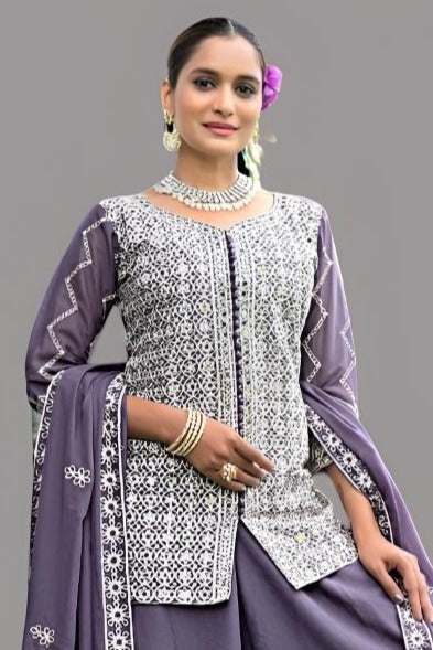 Chic purple tunic and palazzo set, ideal for festive occasions and celebrations.