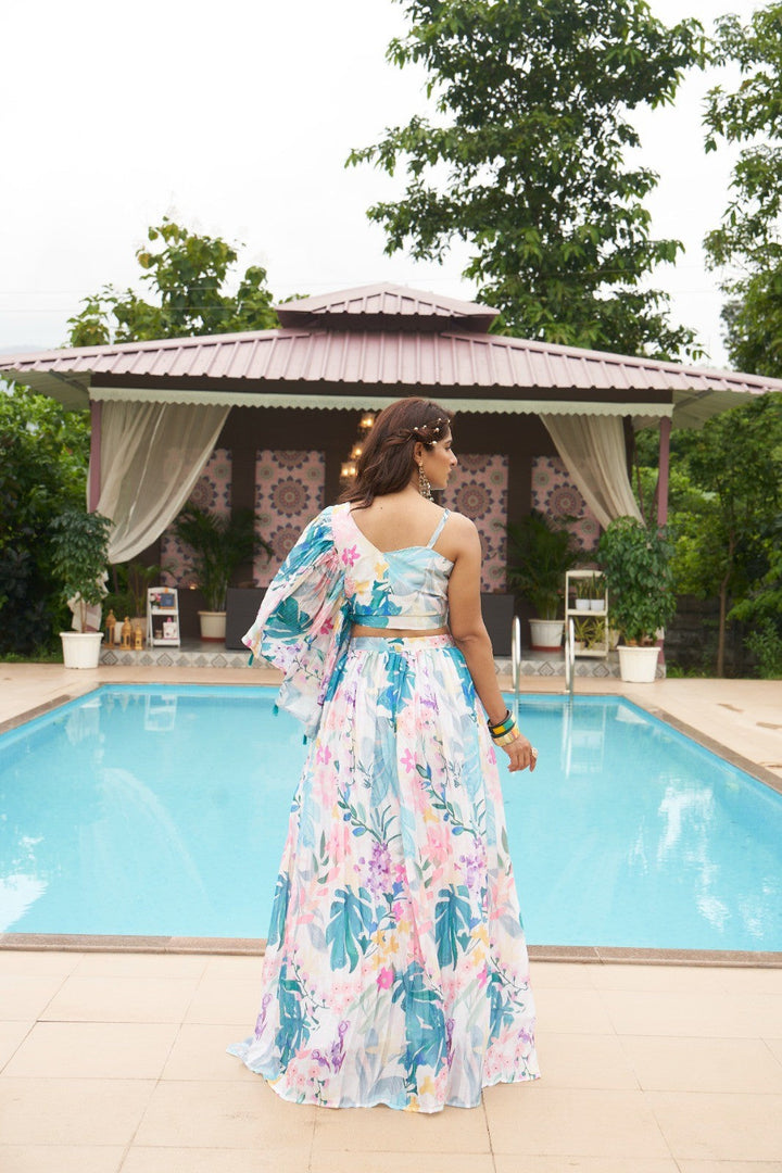 Sophisticated cream crop top lehenga in chinon with floral print, designed for wedding events.