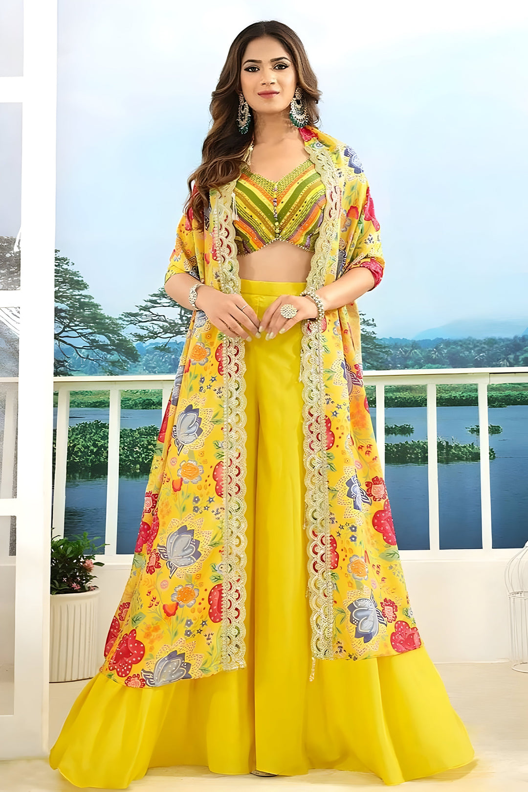 Designer yellow georgette palazzo suit with a floral design and sheer top, perfect for festive occasions and gatherings.