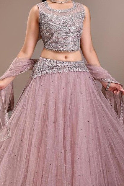 Lavender crop top lehenga featuring floral prints and comfortable Jimmichu fabric, great for weddings and parties.