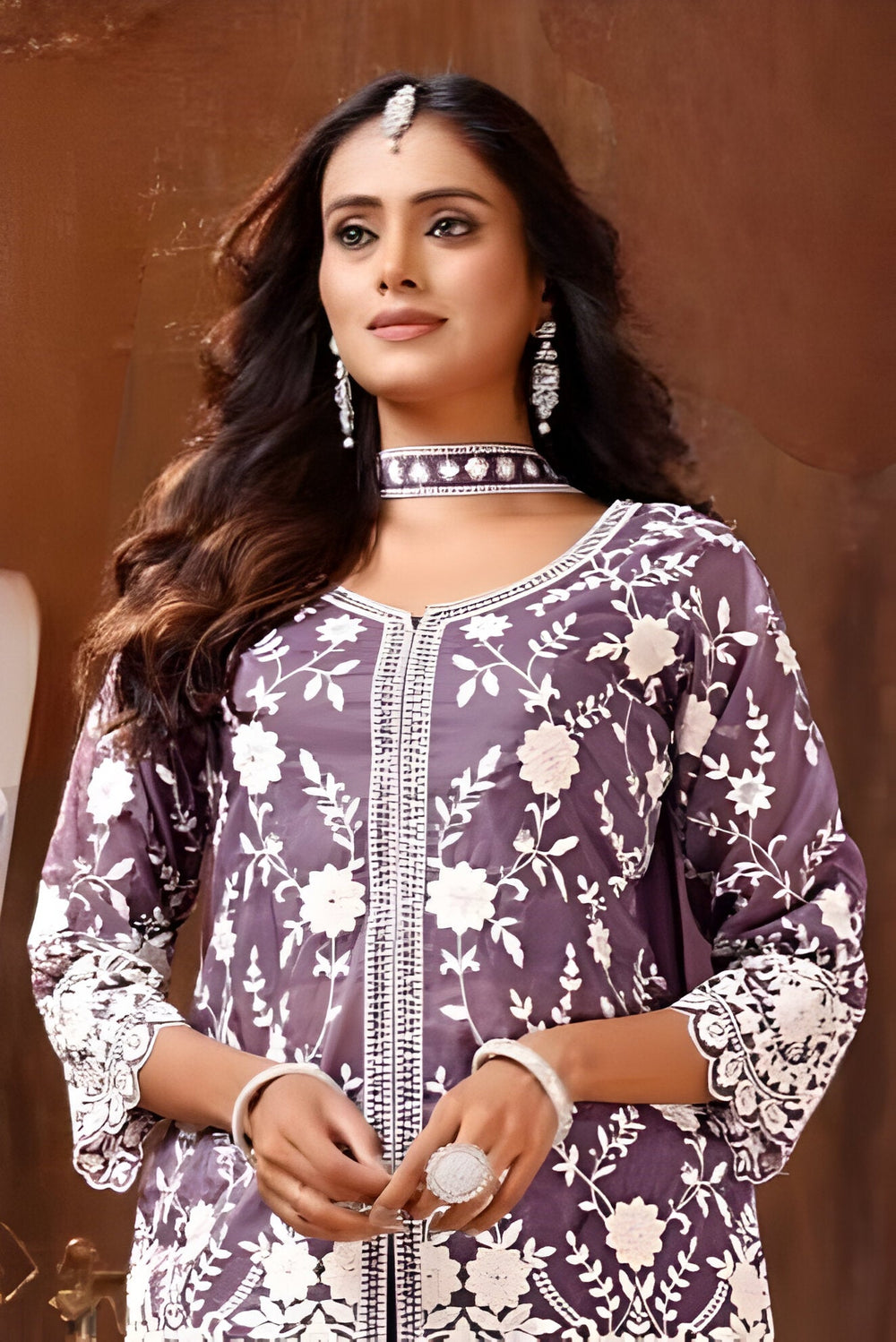 Stylish purple garara with an eye-catching kurti, ideal for weddings and celebrations.