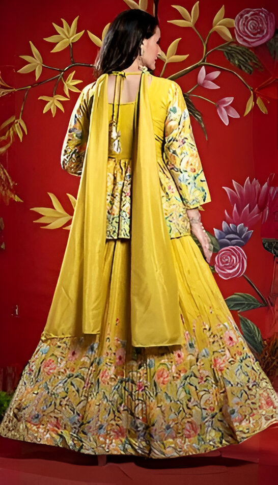 Gorgeous yellow skirt lehenga featuring a stylish peplum top and gotta work details.