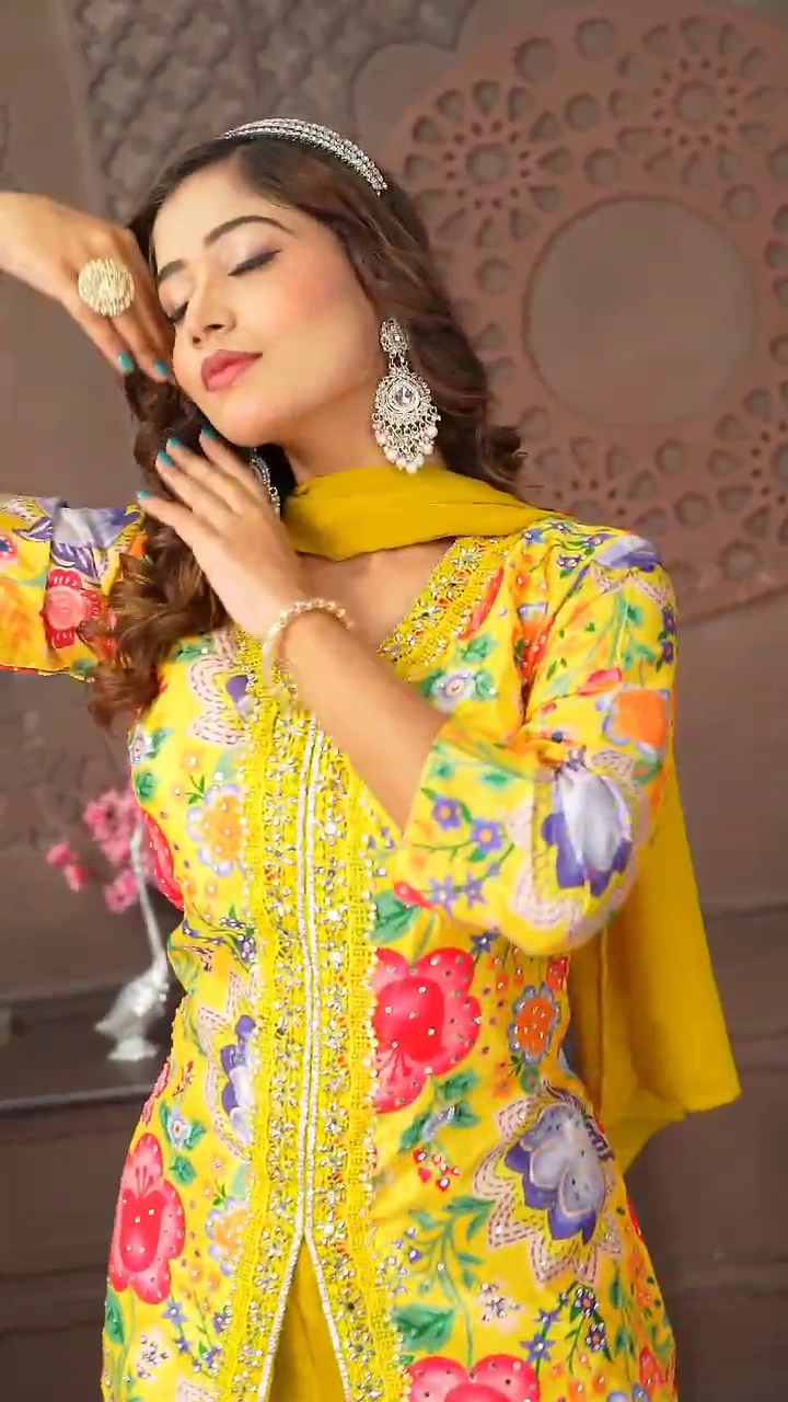 Yellow georgette palazzo outfit with shimmery pants, designed for festive events.