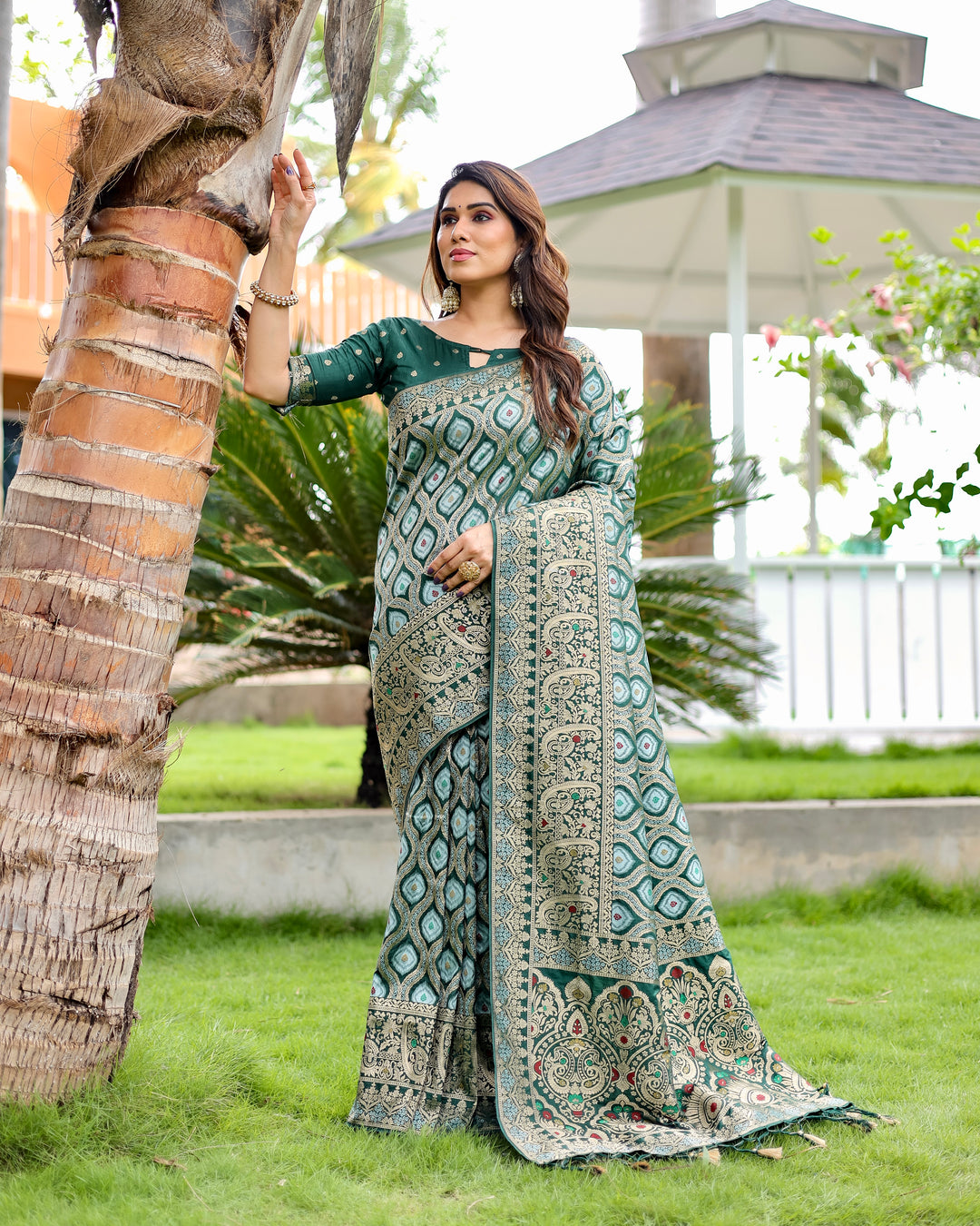 Beautiful green Kanjivaram Silk Saree with intricate zari weaving & embossed texture, perfect for USA bridal wear.