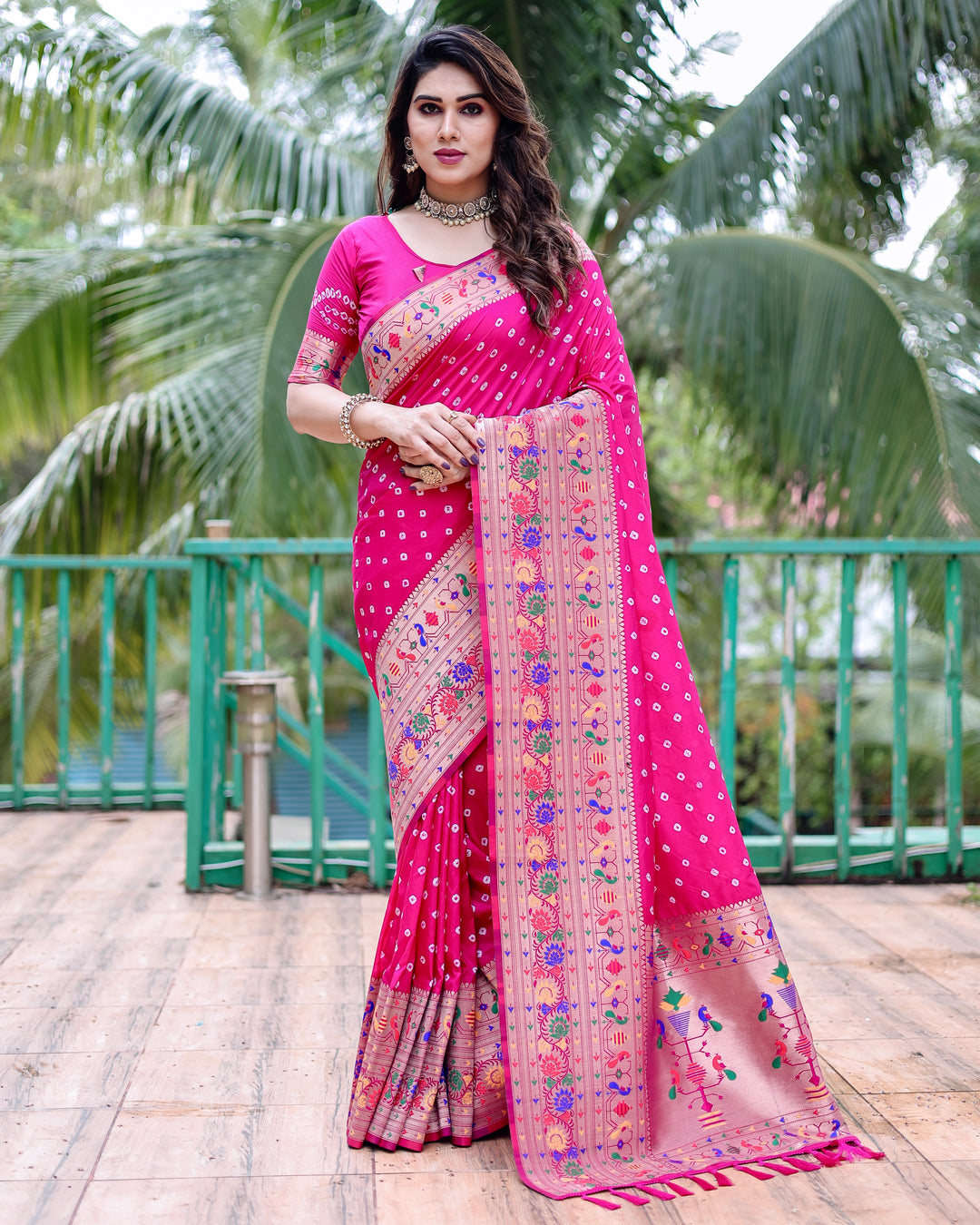 Beautiful Paithani Bandhej silk sadi in red and purple, capturing the essence of traditional Indian elegance.