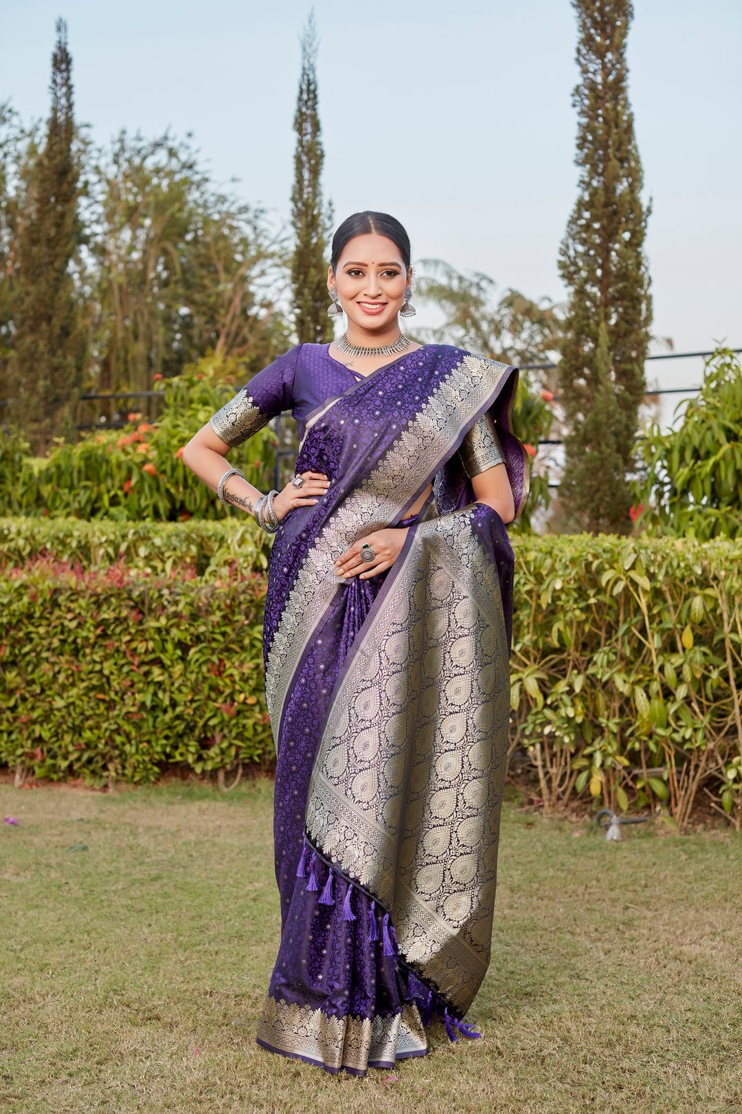 Purple Kanjivaram Satin Silk Saree with intricate Butta and designer border, perfect for festive wear.