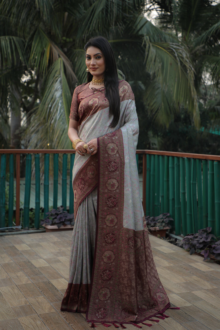 Classic grey silk saree featuring exquisite Kanjivaram work, perfect for traditional celebrations and grand occasions.