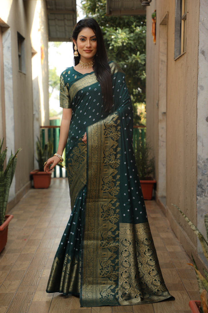 Teal-green Kanjivaram silk saree with intricate detailing and rich pallu for festive events.