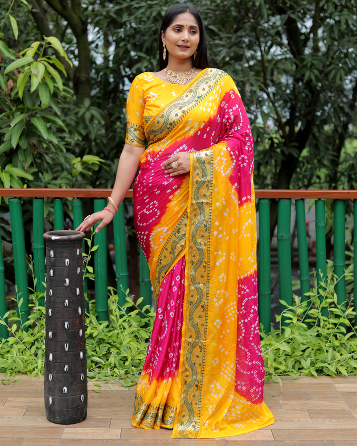 Elegant orange Bandhej Tapeta silk saree with exquisite Bandhej craftsmanship and dual-tone colors.