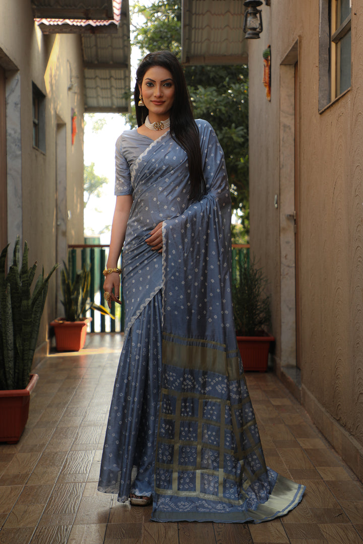 Classic grey Bandhej silk saree with original craft and bold checks design.