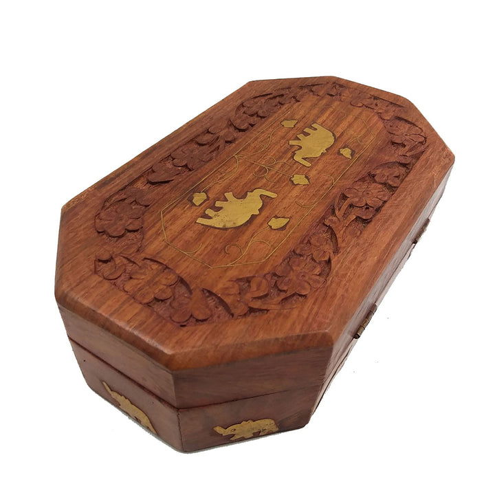 Elegant brown wooden jewelry box with compartments, perfect for organizing your favorite pieces.