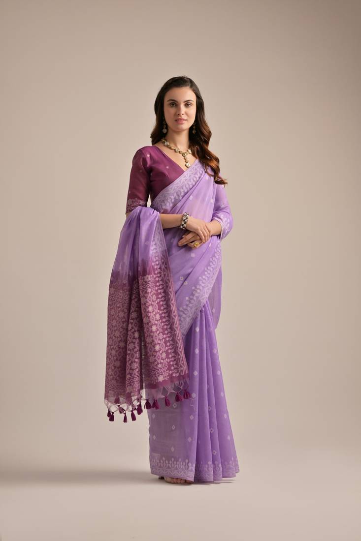 Elegant Muga cotton saree with colorful resham pallu, weaving border, and tassels, crafted for USA market