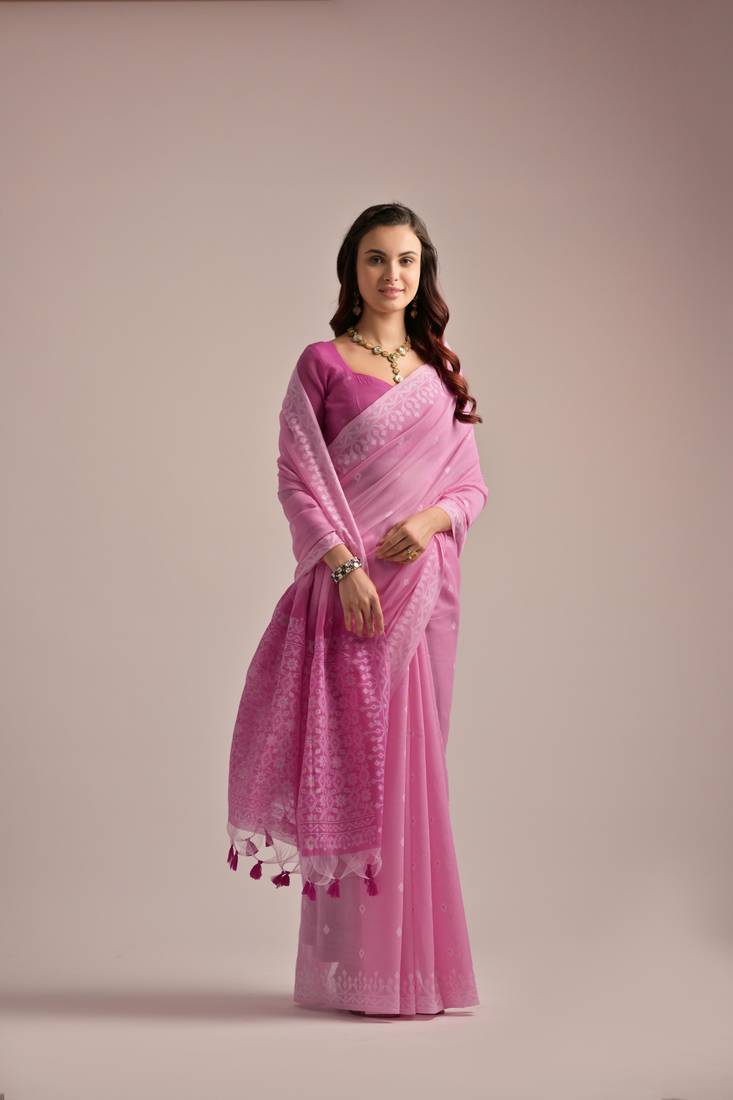 Classic Muga cotton saree with fancy tassels and contrast blouse, perfect for USA weddings and festivities