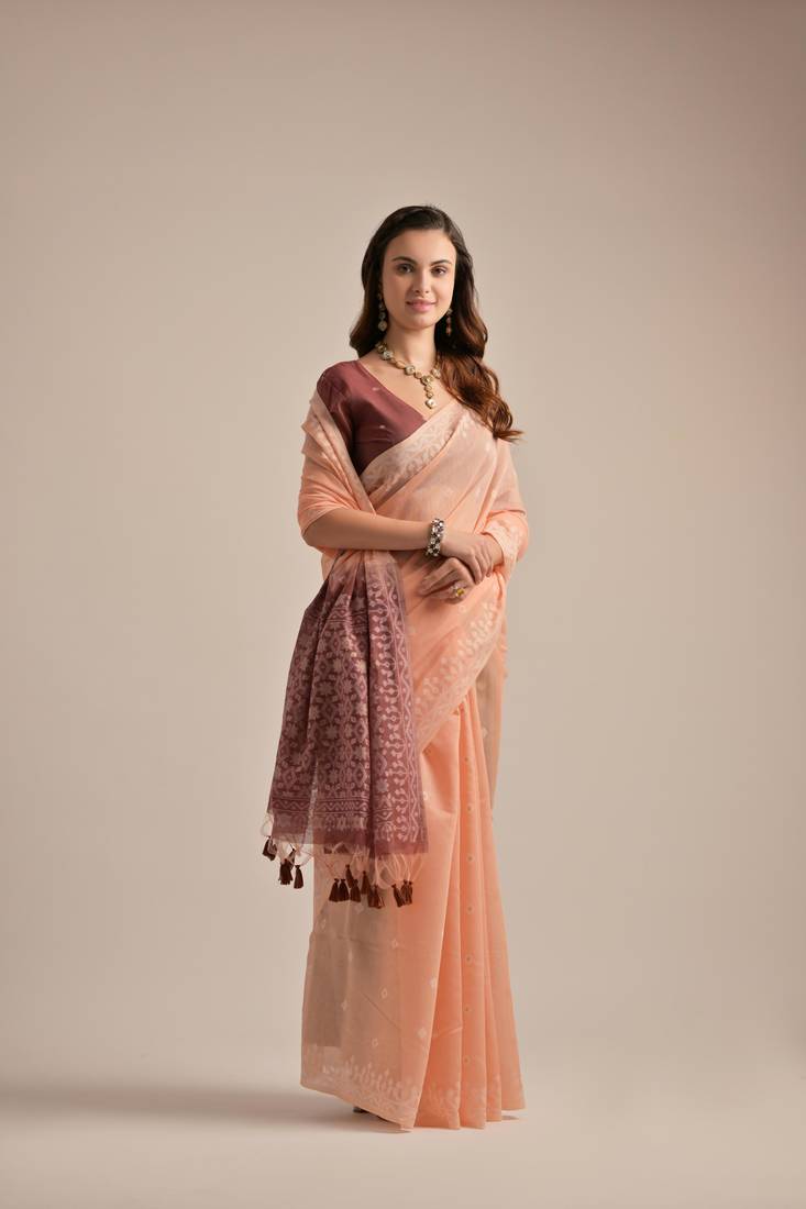 Beautiful Muga cotton saree with resham weaving, fancy tassels, and matching blouse for USA special occasions