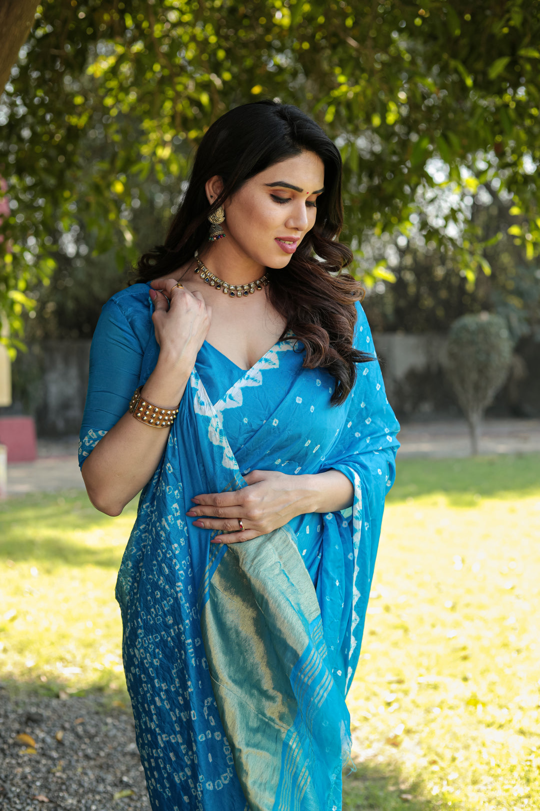 Sky-Blue Premium Bandhej Silk Saree with intricate Zari weaving and designer Pallu for a stylish look.