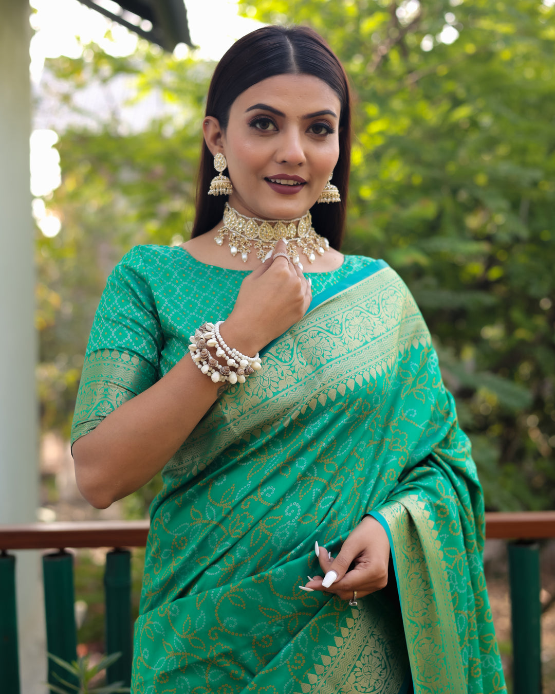 Mint-green Pure Handloom Bandhej Patola Silk Saree with Zari & Kanchi Borders, designed for USA celebrations.