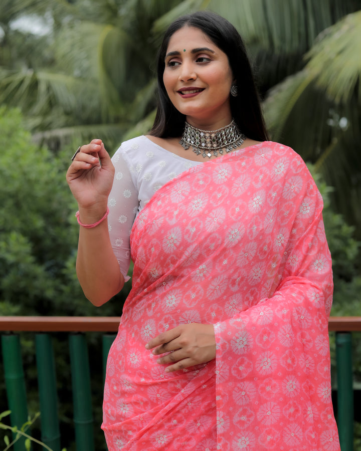 Lovely peach chiffon saree with delicate foil detailing, perfect for weddings and festive occasions.