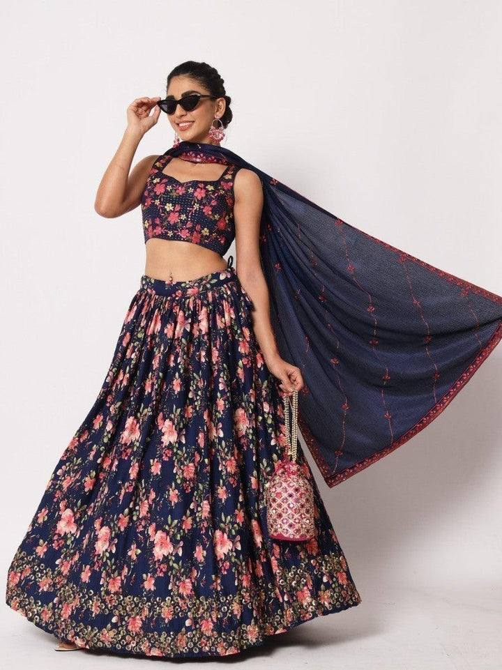 Elegant navy blue lehenga choli with matching embroidered dupatta.